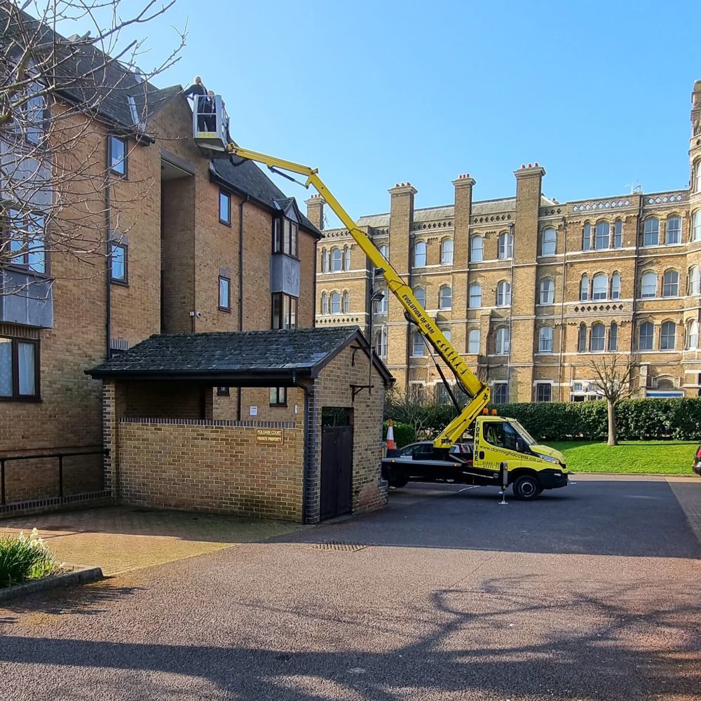 Gutter cleaning from high access crane in kent